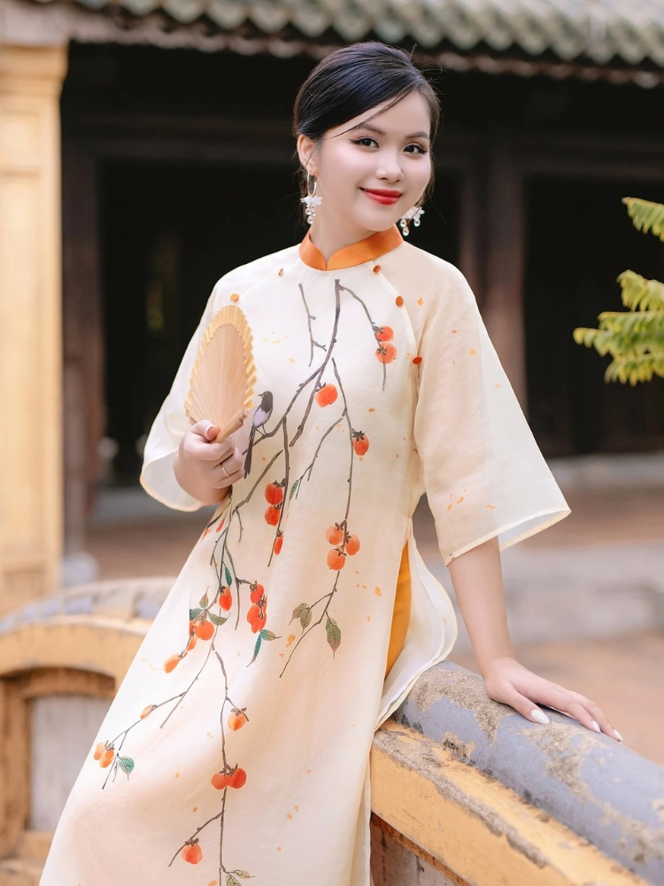 Cách tạo dáng chụp ảnh Tết với áo dài cách tân