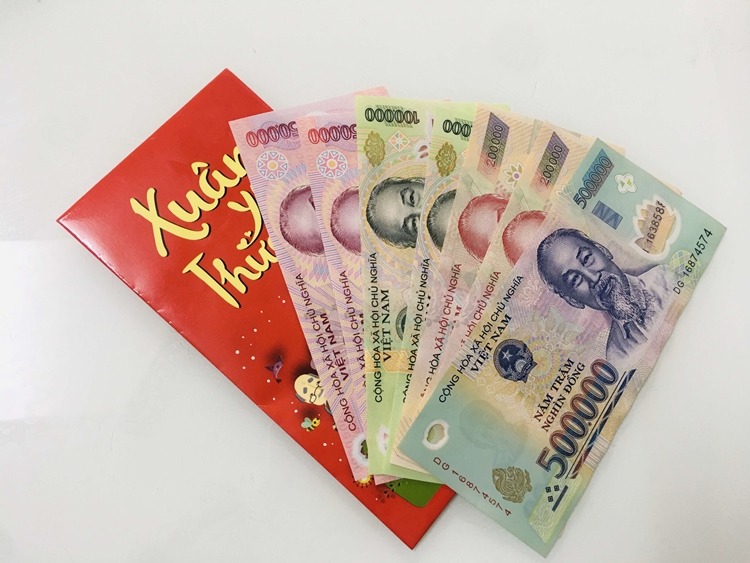 Ý nghĩa lì xì tiền mới, tiền lẻ mang may mắn, khởi đầu năm mới